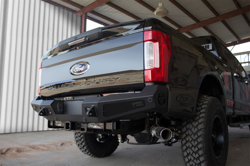 Ford F-250 Rear Bumper - Addictive Desert Designs - HoneyBadger with Lockable Tool Boxes, Backup Sensor Cutouts, and D-Ring Clevis Mounts - Hammer Black and Satin Black - `17-`27
